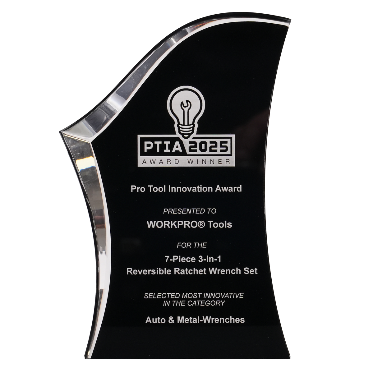 Black glass innovation award trophy with silver trim, light bulb emblem, and engraved recognition for a wrench set