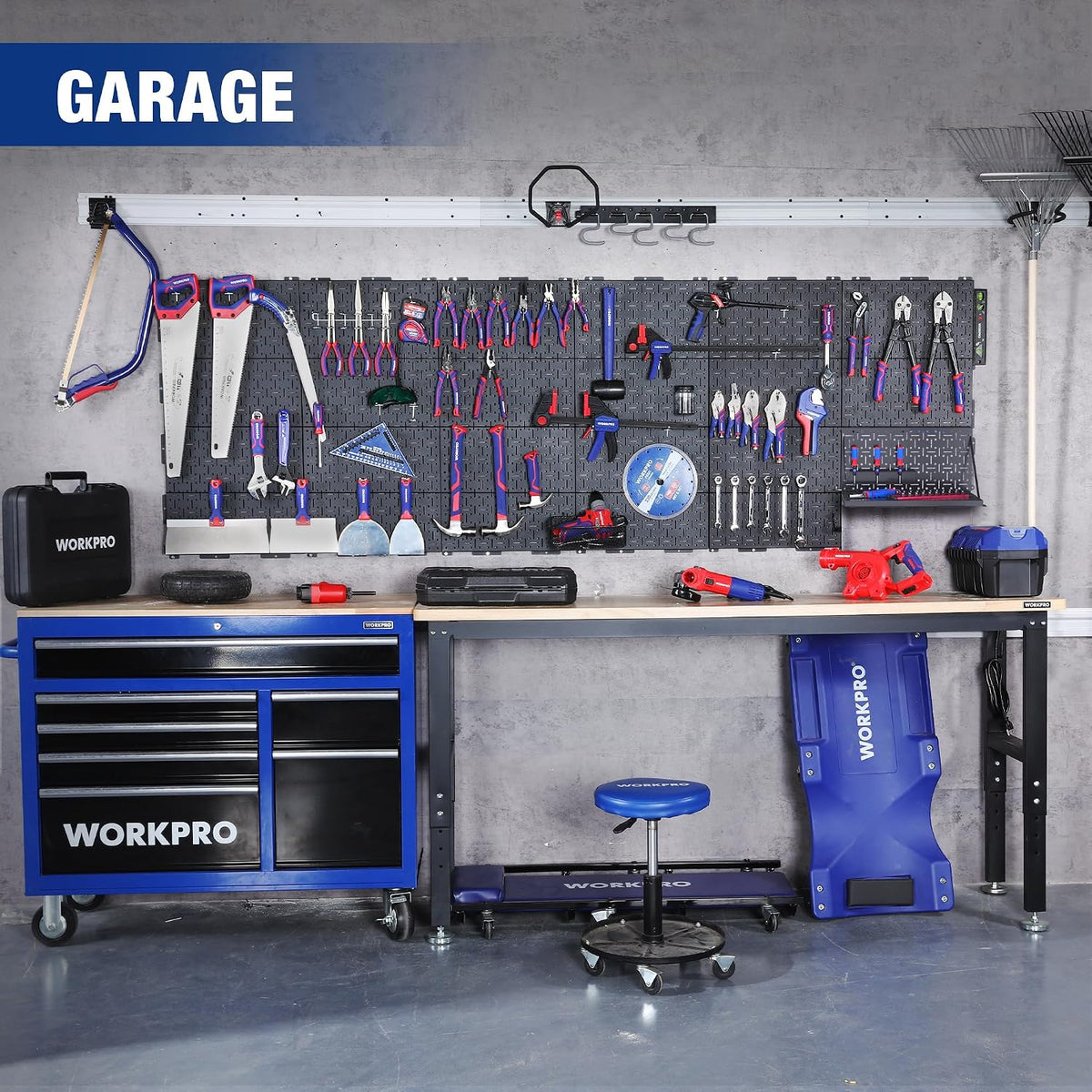 Black metal pegboard tool organizer on garage wall with hanging hand tools