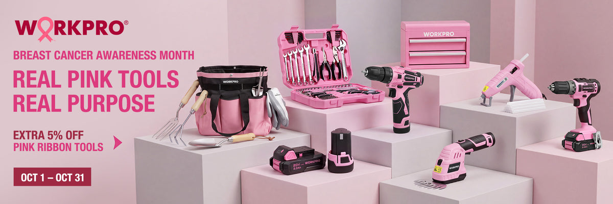 Pink Workpro tools and cases displayed on pedestals for breast cancer awareness, including drills, a saw, and hand tools