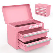 Pink mini metal tool box with top storage and two drawers, open for tools.