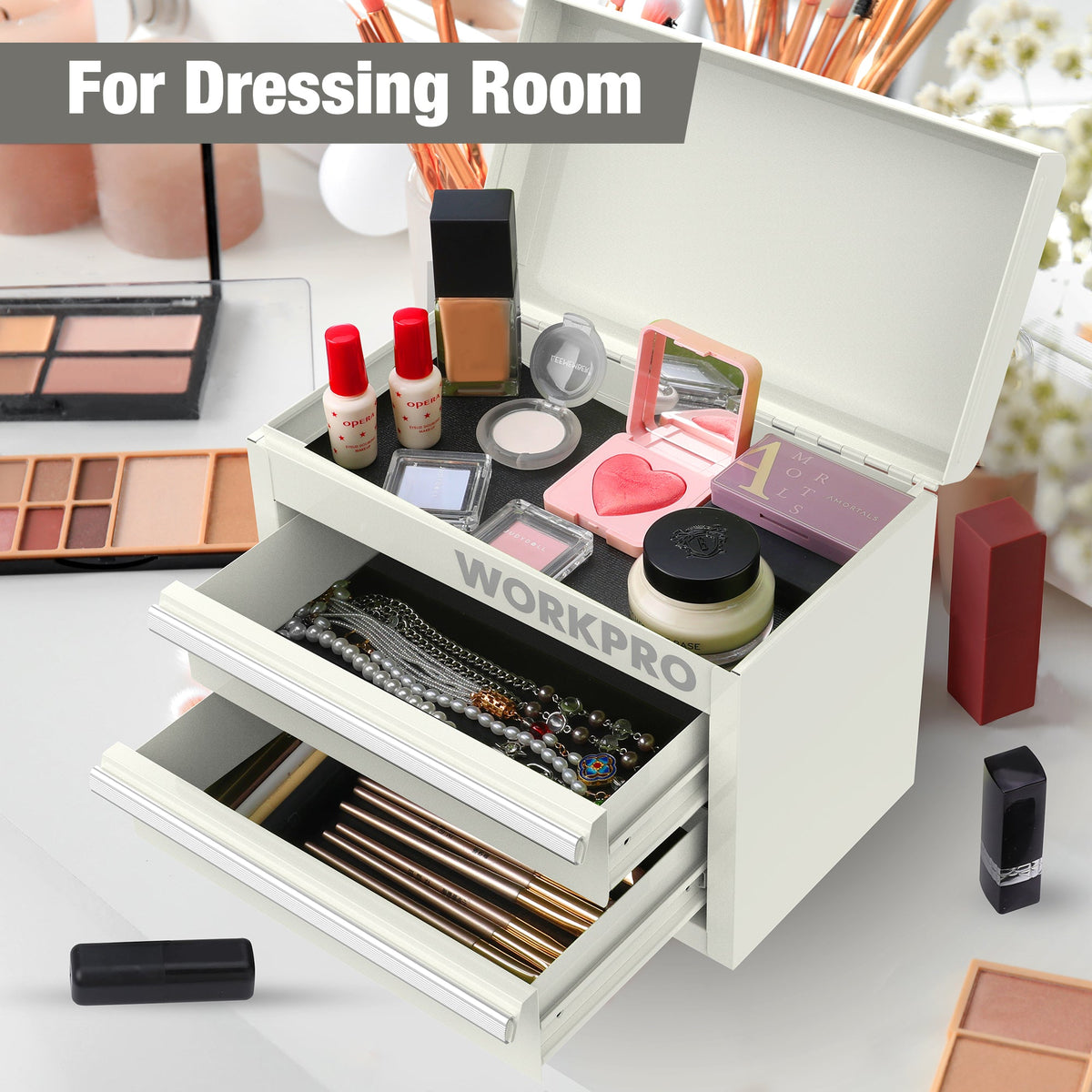 White mini tool box with open drawers filled with small cosmetics and tools