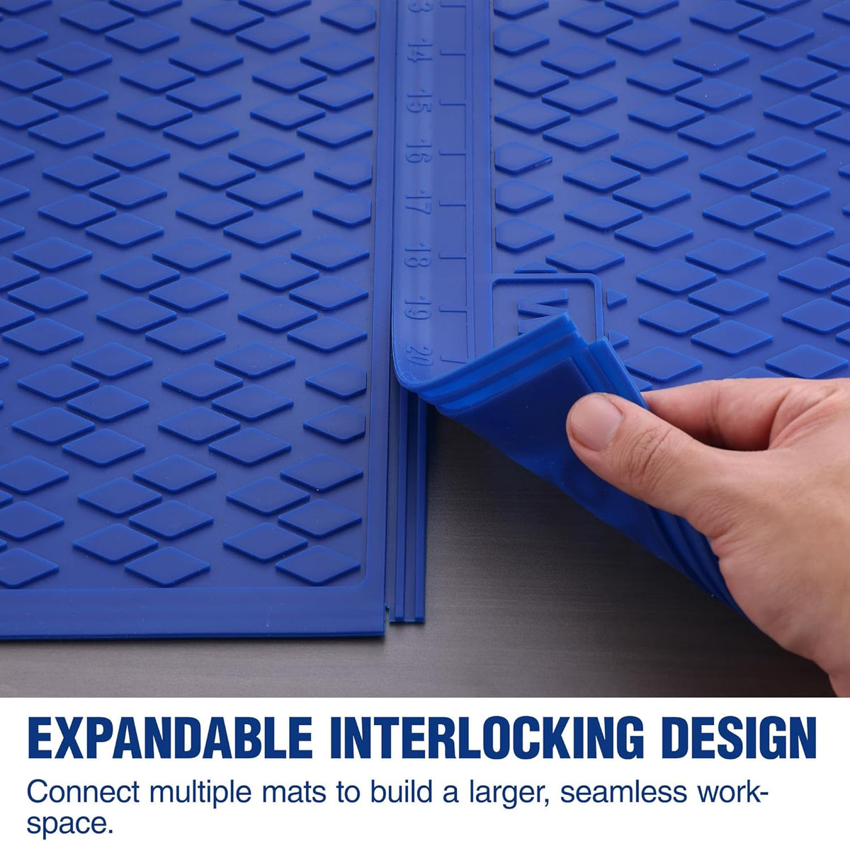 Blue silicone mat edge with measurement strip; textured interlocking pattern
