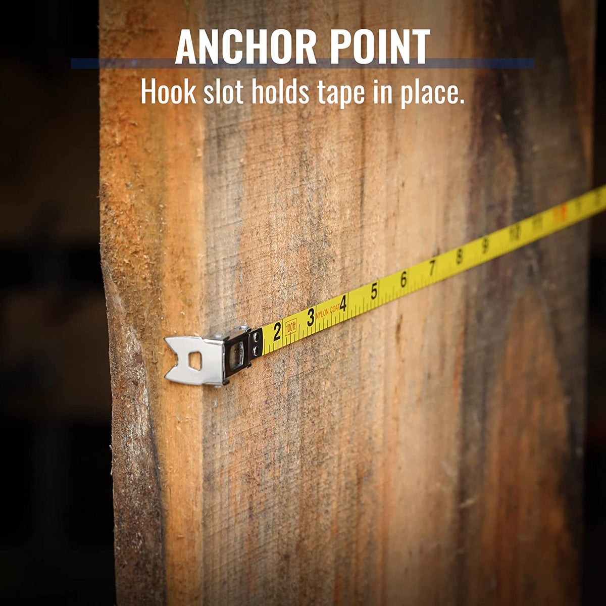 Steel tape measure anchor point on wood with metal hook and yellow tape markings